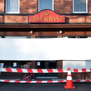 Exterior view of Cafe Old Vienna with construction barriers