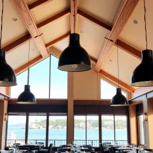Interior view of Uptown Bistro with elegant decor and water view.