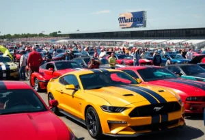 Crowd enjoying Ford Mustangs at Mustang Week event