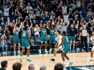 Coastal Carolina basketball team celebrates victory