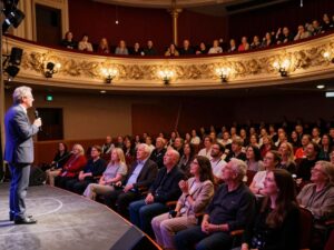 Audience enjoying a live performance at a local theatre in Myrtle Beach