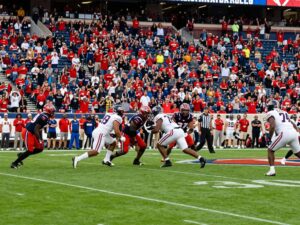 Football players in a college bowl game