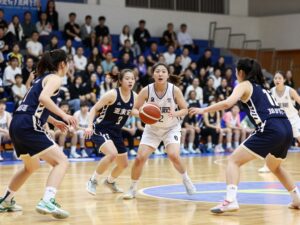 Coastal Carolina Chanticleers competing against Appalachian State Mountaineers in a women's basketball game.