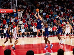Action shot of Coastal Carolina basketball players during a game
