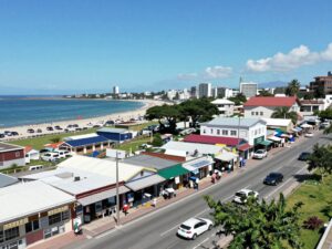 Coastal city scene of Myrtle Beach with small businesses and community development.