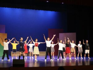 Students performing in a high school theatre production