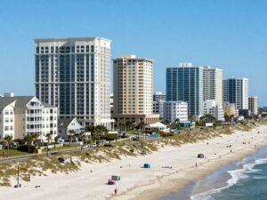 Skyline of Myrtle Beach with multifamily buildings and beach
