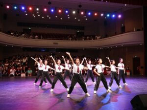 Myrtle Beach High School dance team performing on stage.